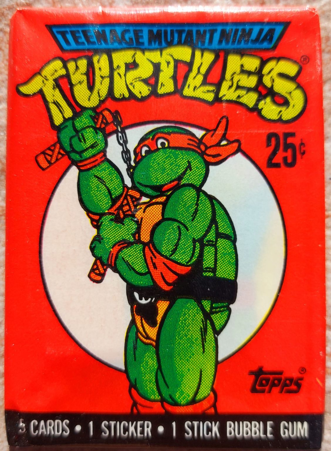 Teenage Mutant Ninja Turtles 1st series genuine sealed unopened wax pack cards with gum from Topps, 1989. Michelangelo.
